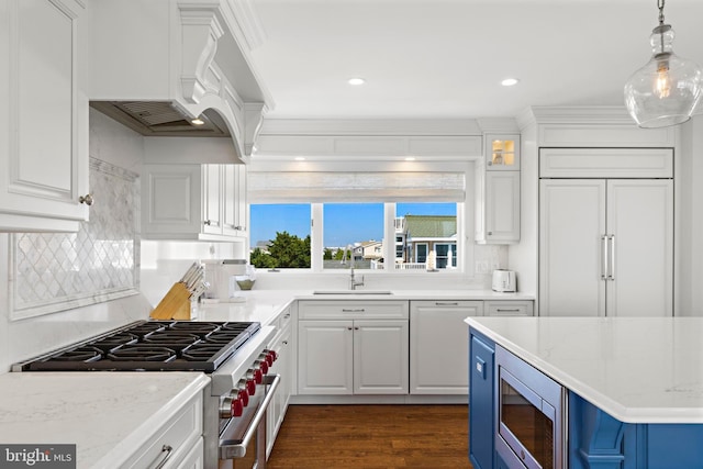 10 11th St, Beach Haven, NJ 08008 - kitchen with built in appliances, white cabinets, backsplash, dark wood-type flooring, and pendant lighting