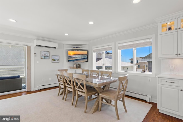 10 11th St, Beach Haven, NJ 08008 - dining space featuring an AC wall unit, a baseboard heating unit, ornamental molding, dark wood finished floors, and recessed lighting