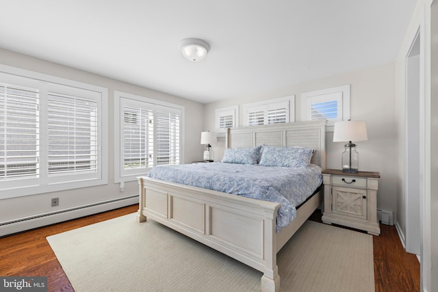 10 11th St, Beach Haven, NJ 08008 - bedroom featuring dark wood-style floors and a baseboard heating unit