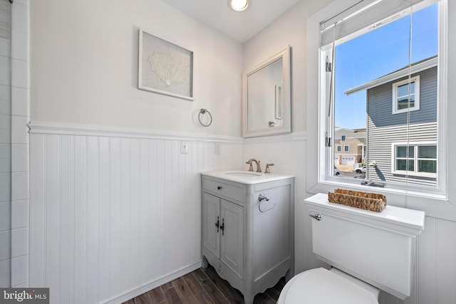 10 11th St, Beach Haven, NJ 08008 - bathroom featuring wood finished floors, vanity, and a wainscoted wall