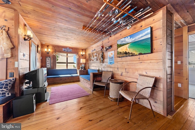 10 11th St, Beach Haven, NJ 08008 - sitting room with wood walls, wooden ceiling, and hardwood / wood-style floors