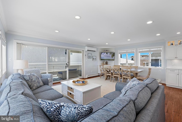 10 11th St, Beach Haven, NJ 08008 - living area with crown molding, wood finished floors, baseboard heating, recessed lighting, and a wall unit AC