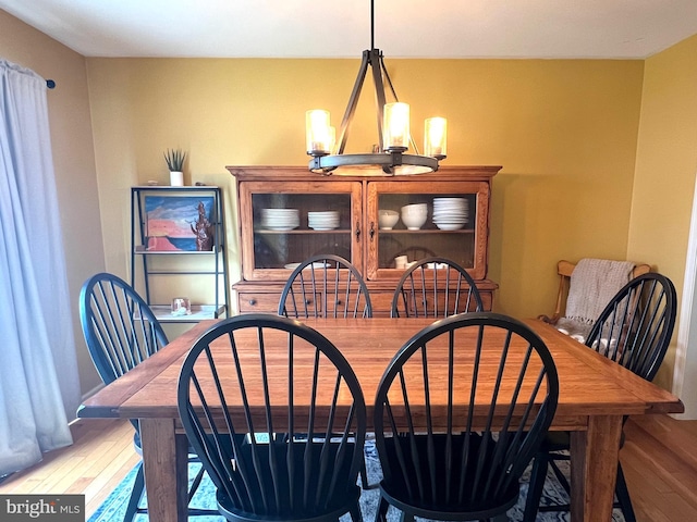 210 W Walnut St, Marietta, PA 17547 - dining room featuring a chandelier and wood finished floors