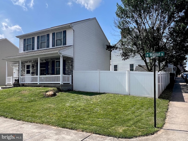 210 W Walnut St, Marietta, PA 17547 - view of front facade with covered porch and stone siding