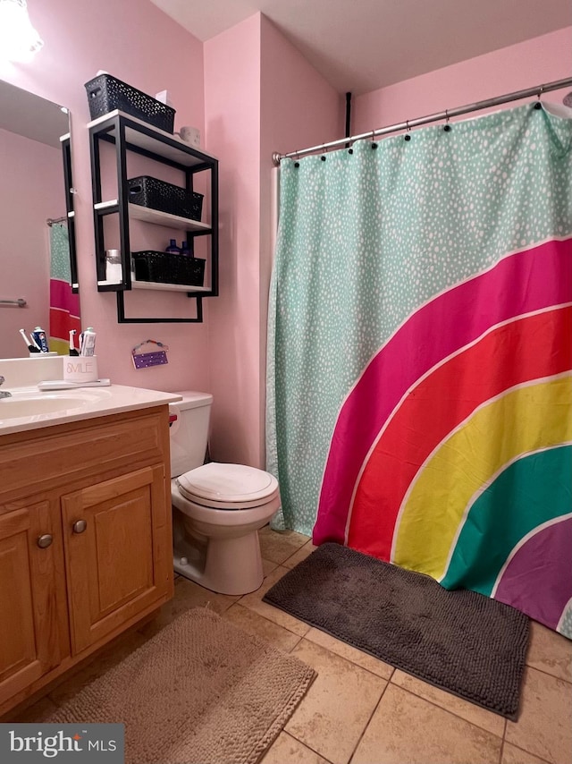 210 W Walnut St, Marietta, PA 17547 - full bathroom featuring vanity, tile patterned flooring, and a shower with shower curtain
