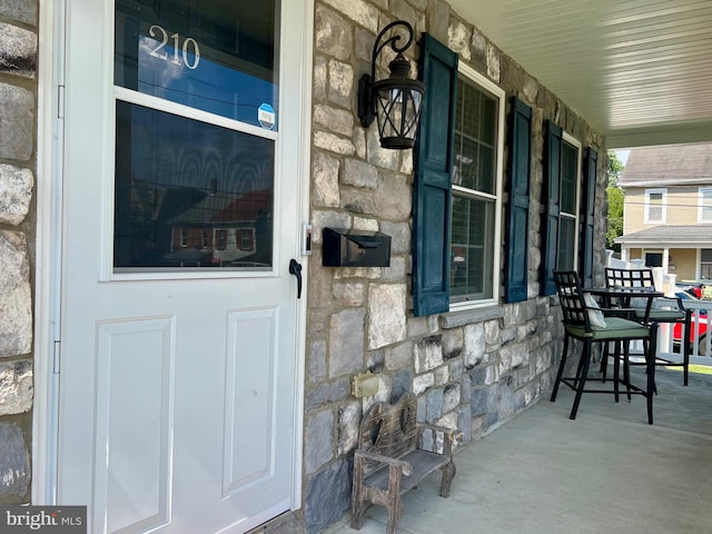 210 W Walnut St, Marietta, PA 17547 - entrance to property with stone siding and covered porch