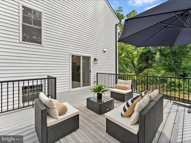11433 Popes Head Rd, Fairfax, VA 22030 - wooden terrace with an outdoor living space