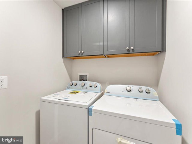 11433 Popes Head Rd, Fairfax, VA 22030 - laundry area featuring washing machine and clothes dryer and cabinet space