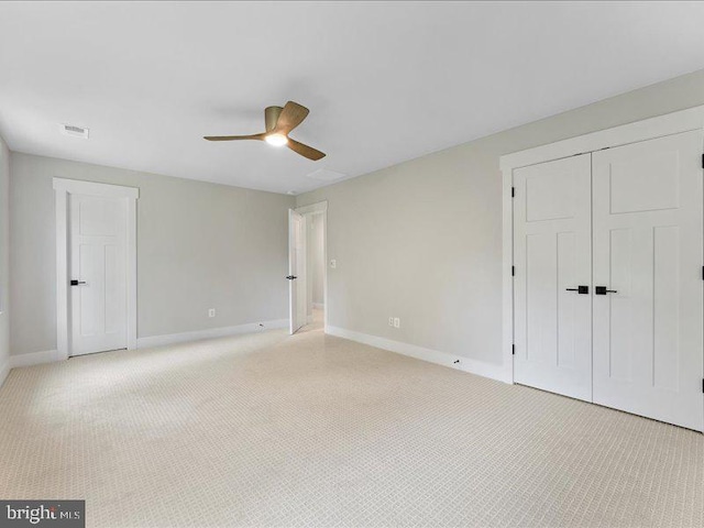 11433 Popes Head Rd, Fairfax, VA 22030 - unfurnished bedroom featuring light carpet, a ceiling fan, and a closet