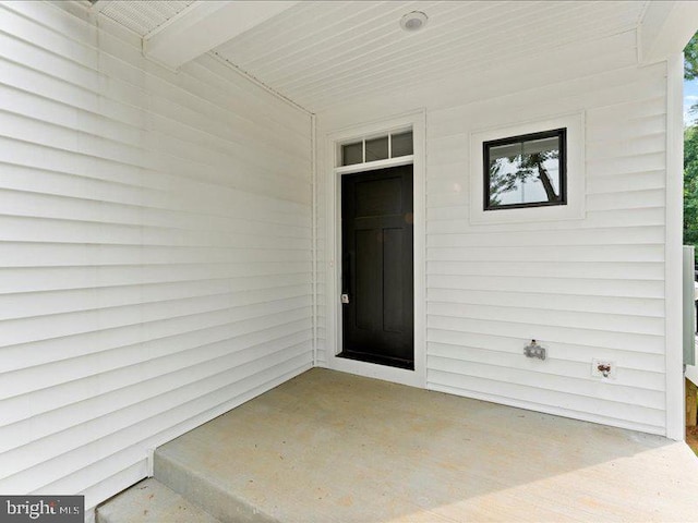 11433 Popes Head Rd, Fairfax, VA 22030 - view of exterior entry featuring a patio