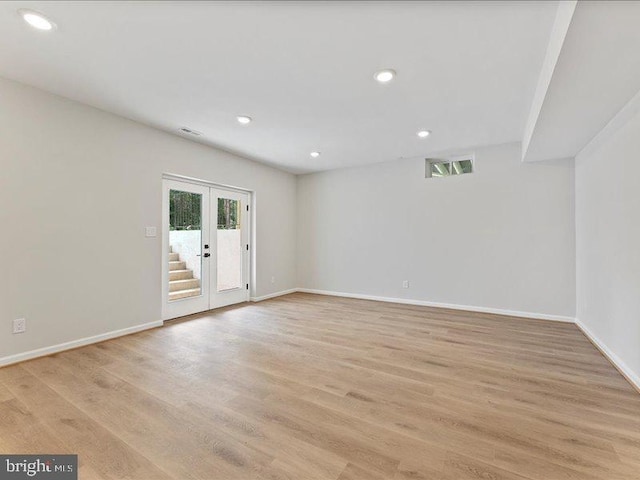 11433 Popes Head Rd, Fairfax, VA 22030 - unfurnished room featuring light wood-style flooring, french doors, and recessed lighting