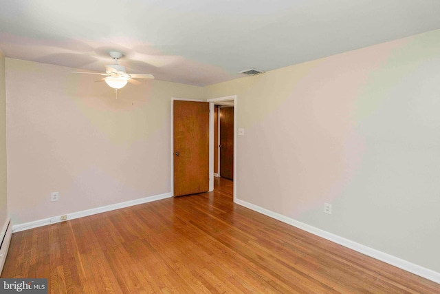 803 Libby Ln, Langhorne, PA 19053 - spare room featuring a ceiling fan, wood finished floors, and baseboard heating