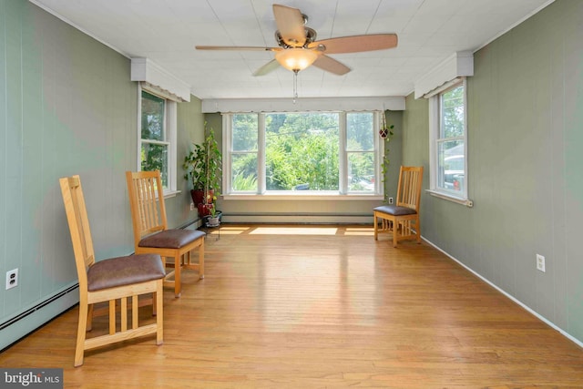 803 Libby Ln, Langhorne, PA 19053 - sitting room featuring a baseboard heating unit, wood finished floors, baseboard heating, and a ceiling fan