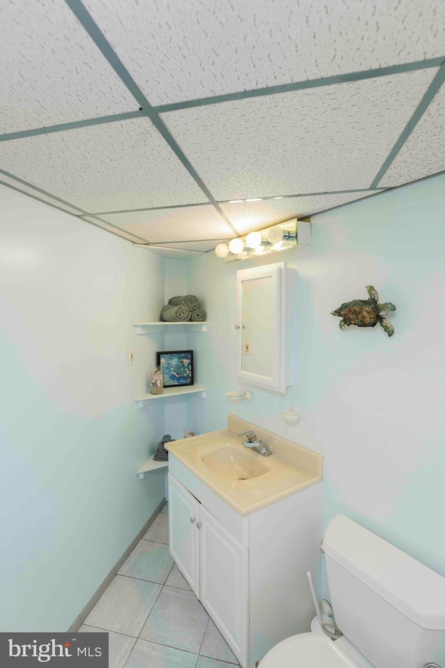 803 Libby Ln, Langhorne, PA 19053 - half bath with a drop ceiling, vanity, and tile patterned flooring