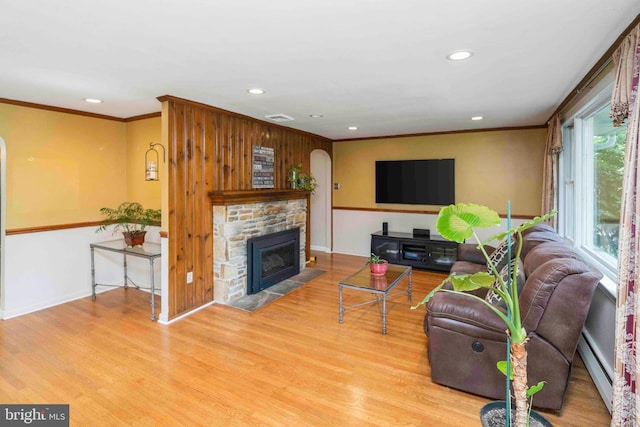 803 Libby Ln, Langhorne, PA 19053 - living area with baseboard heating, recessed lighting, crown molding, wood finished floors, and a fireplace
