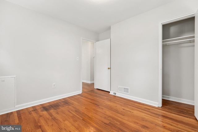 10409 Royalton Ter, Silver Spring, MD 20901 - unfurnished bedroom featuring wood finished floors and a closet