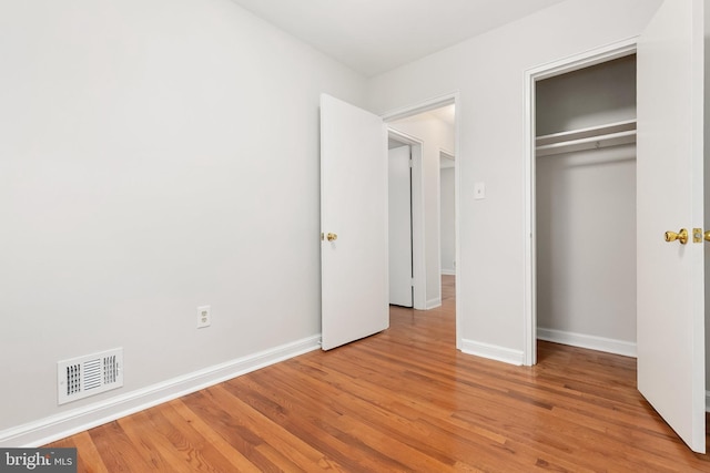 10409 Royalton Ter, Silver Spring, MD 20901 - unfurnished bedroom featuring light wood-type flooring and a closet