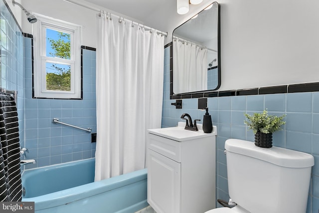 10409 Royalton Ter, Silver Spring, MD 20901 - full bathroom with vanity, shower / bath combo with shower curtain, and tile walls