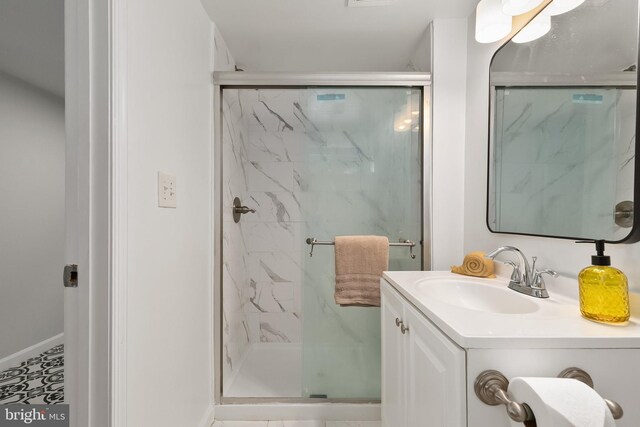 10409 Royalton Ter, Silver Spring, MD 20901 - full bathroom featuring a marble finish shower and vanity