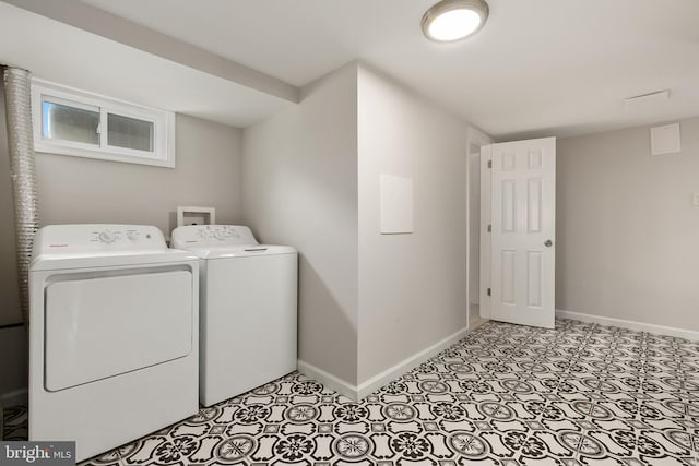 10409 Royalton Ter, Silver Spring, MD 20901 - laundry room with baseboards and washer and dryer