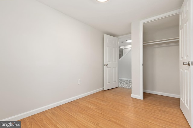 10409 Royalton Ter, Silver Spring, MD 20901 - unfurnished bedroom with light wood-style floors and a closet