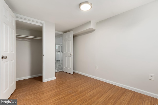 10409 Royalton Ter, Silver Spring, MD 20901 - unfurnished bedroom with light wood-style floors and a closet