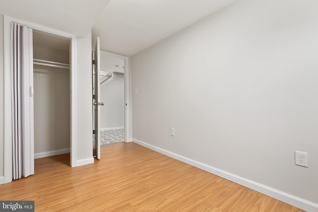 10409 Royalton Ter, Silver Spring, MD 20901 - unfurnished bedroom featuring light wood-style flooring and a closet