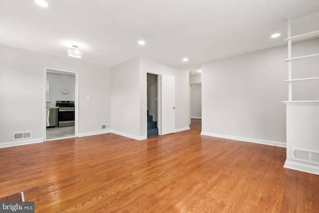 10409 Royalton Ter, Silver Spring, MD 20901 - spare room with stairs, recessed lighting, and light wood-style floors