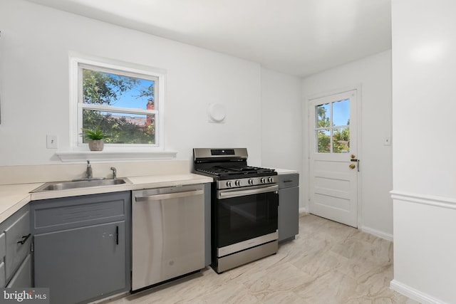 10409 Royalton Ter, Silver Spring, MD 20901 - kitchen with appliances with stainless steel finishes, gray cabinetry, and light countertops