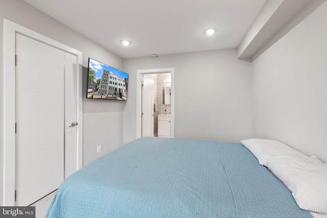 1638 K St NE Unit 101, Washington, DC 20002 - bedroom with recessed lighting and ensuite bath