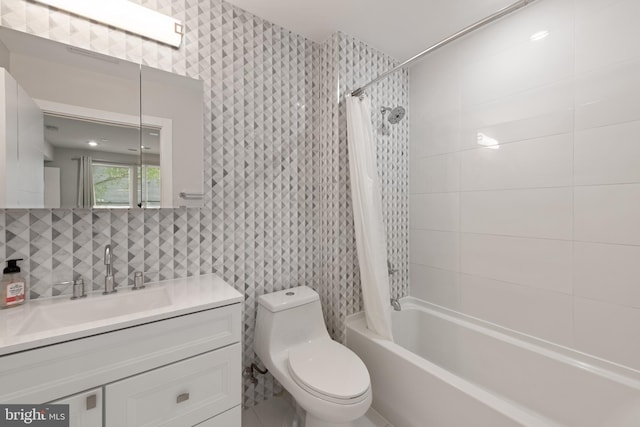 1638 K St NE Unit 101, Washington, DC 20002 - full bath with vanity, shower / bathtub combination with curtain, and wallpapered walls