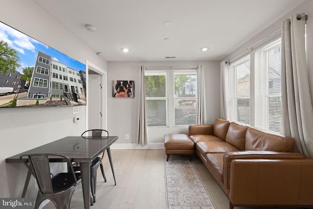 1638 K St NE Unit 101, Washington, DC 20002 - living area with light wood-style flooring and recessed lighting