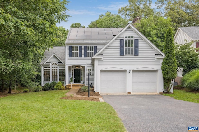1433 River Oaks Rdg, Charlottesville, VA 22901 - traditional-style house featuring asphalt driveway, an attached garage, solar panels, a chimney, and a front yard