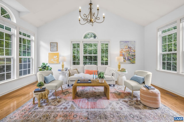 1433 River Oaks Rdg, Charlottesville, VA 22901 - living area with a chandelier, wood finished floors, and high vaulted ceiling