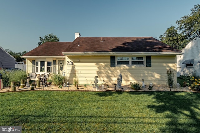 24 Paul Rd, Maple Shade, NJ 08052 - rear view of house featuring a yard and a chimney