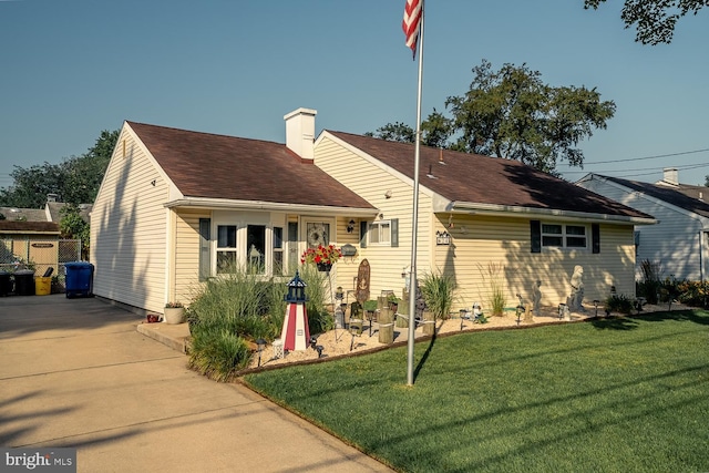 24 Paul Rd, Maple Shade, NJ 08052 - view of front facade with a front lawn and a chimney