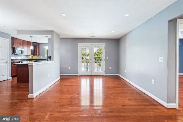 4163 S Four Mile Run Dr Unit 401, Arlington, VA 22204 - unfurnished living room featuring dark wood-style floors and recessed lighting