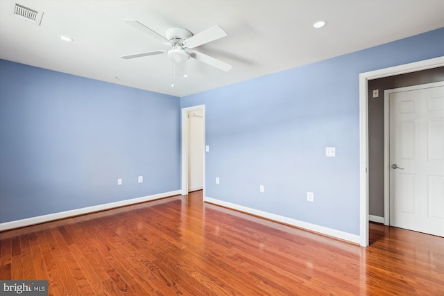 4163 S Four Mile Run Dr Unit 401, Arlington, VA 22204 - unfurnished room featuring ceiling fan, wood finished floors, and recessed lighting