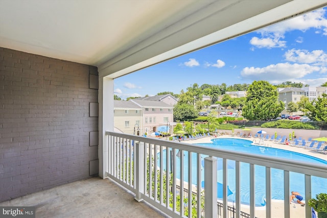 4163 S Four Mile Run Dr Unit 401, Arlington, VA 22204 - balcony featuring view of pool area and a residential view