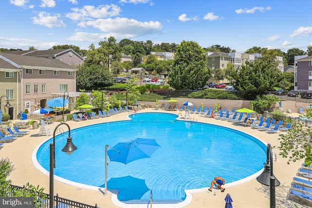 4163 S Four Mile Run Dr Unit 401, Arlington, VA 22204 - community pool featuring a patio area and a residential view