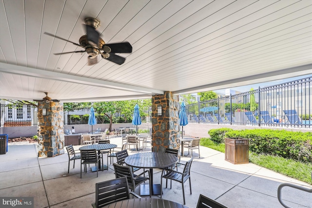 4163 S Four Mile Run Dr Unit 401, Arlington, VA 22204 - view of patio with outdoor dining area and a ceiling fan