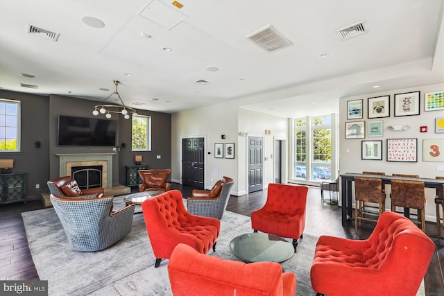4163 S Four Mile Run Dr Unit 401, Arlington, VA 22204 - living room featuring a glass covered fireplace, wood finished floors, and recessed lighting