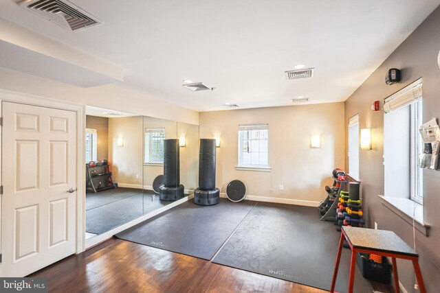 4163 S Four Mile Run Dr Unit 401, Arlington, VA 22204 - exercise area with wood finished floors and recessed lighting