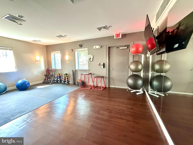 4163 S Four Mile Run Dr Unit 401, Arlington, VA 22204 - exercise area featuring wood finished floors