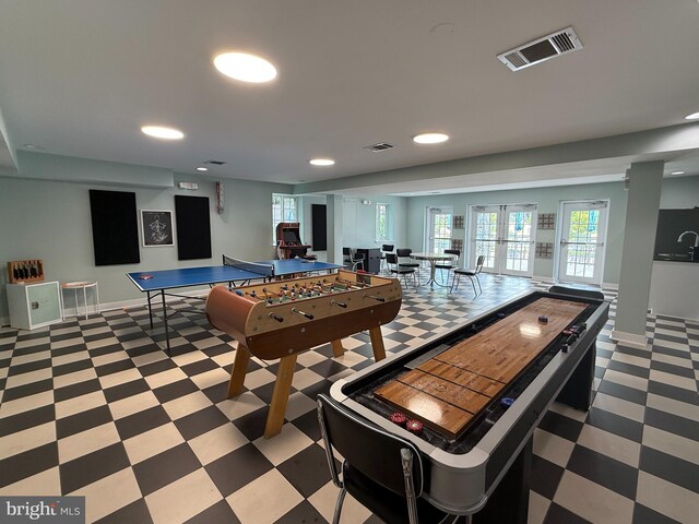 4163 S Four Mile Run Dr Unit 401, Arlington, VA 22204 - playroom with light floors, recessed lighting, and french doors
