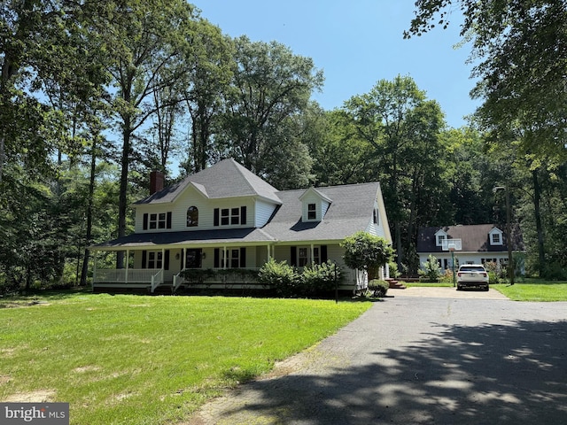 7071 Pomona Rd, Chestertown, MD 21620 - view of front of home featuring covered porch, a chimney, a front yard, and driveway