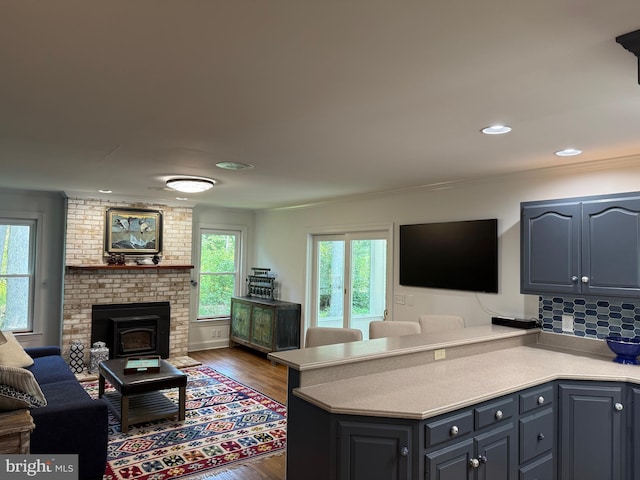7071 Pomona Rd, Chestertown, MD 21620 - kitchen featuring open floor plan, a peninsula, light countertops, dark wood finished floors, and recessed lighting