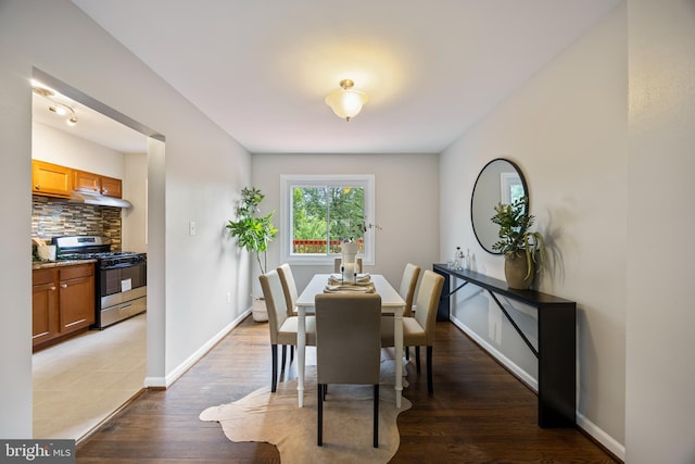 4703 Williston St, Baltimore, MD 21229 - dining room featuring wood finished floors