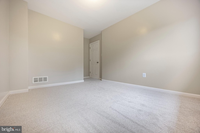 4703 Williston St, Baltimore, MD 21229 - empty room with light carpet and baseboards