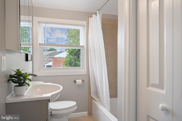 4703 Williston St, Baltimore, MD 21229 - full bathroom with vanity and shower / tub combo with curtain